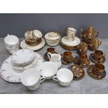 Three part tea services, one Victorian with gilt decoration, a Japanese, and one by wedgwood.