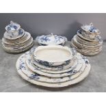 A Victorian Booths part dinner service, with blue and white transfer printed and gilt decoration.