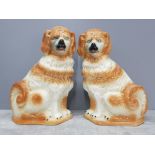 Pair of Staffordshire style dog ornaments