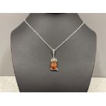 Silver amber style Owl pendant and necklace stamped 925 measuring 44cm in lenth 5.4g gross