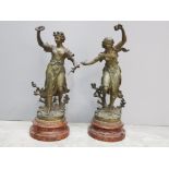 Pair of French spelter figures on wooden plinths, Recompense par Rancoulet, height 44cm