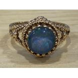 A 9ct yellow gold and opal ring, in claw setting, 3.2g gross, size L.