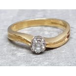 An 18ct yellow gold and diamind solitare ring, the diamond weighing .15 carats, 4.2g gross, size O