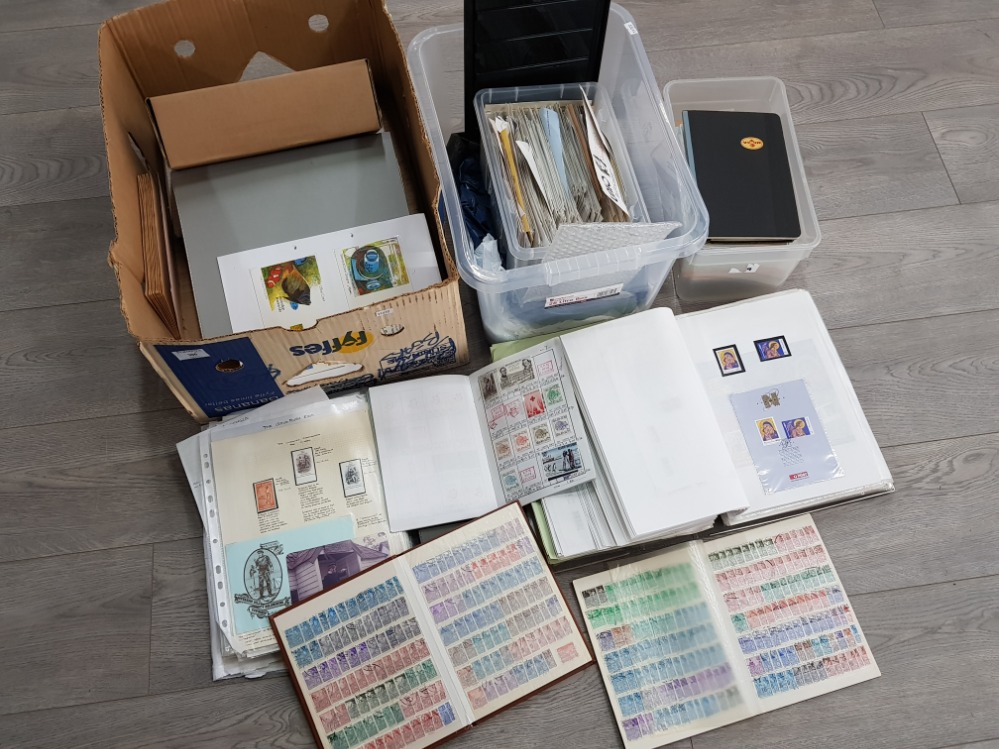 2 boxes of uncirculated stamps from around the world some in albums, also includes religious themed