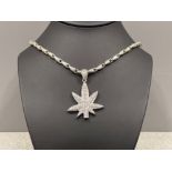 Silver ornate neck chain with CZ set Cannabis leaf pendant (69.9g)