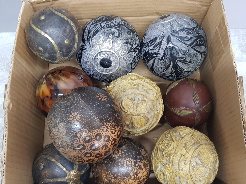 Various decorative balls and carpet bowles in wood pottery etc.