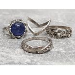 4 silver rings including wishbone, CZ band and blue stone etc, 10.1g gross