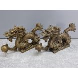 Pair of brass Chinese foo dragons, 13x7cm