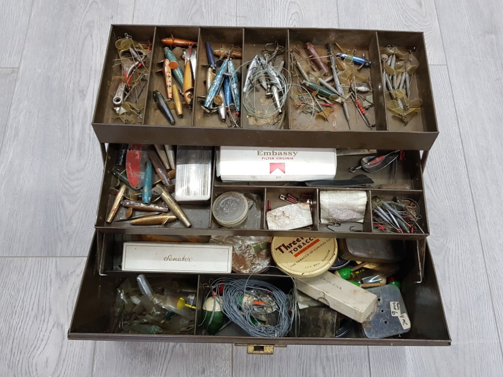 Fishing tackle box with contents.