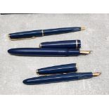 A gents blue parker fountain pen with 14k gold nib, a ladies parker fountain pen with 14k gold