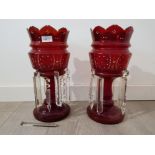 A pair of victorian ruby glass lustres with enamel and gilt decoration, 38.5cm high.