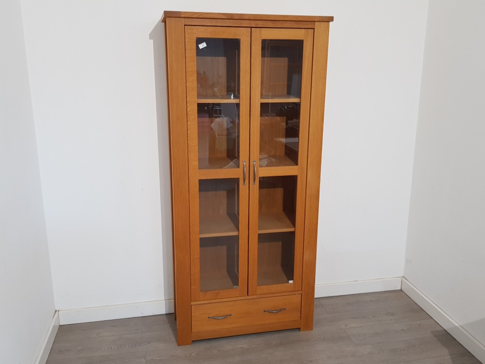 Solid light Oak 4 tier bookcase with glazed doors, also fitted with a single drawer 90x191cm