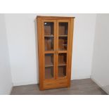 Solid light Oak 4 tier bookcase with glazed doors, also fitted with a single drawer 90x191cm