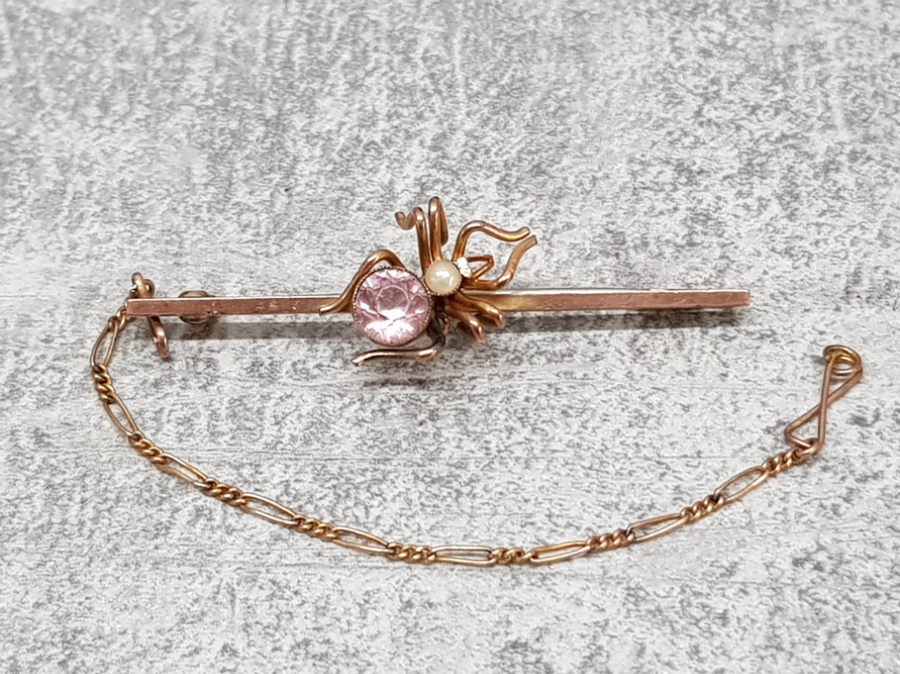 A Victorian style 9ct rose gold pink stone and pearl bug brooch, with safety chain, stamped 9ct, 3.