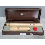 A Moeck two piece barock recorder in fitted case.