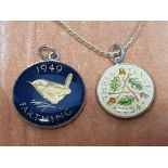 2 enamel decorated coin pendants, one with chain