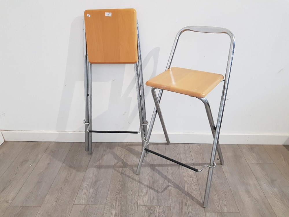 A pair of Italian breakfast bar stools by Fiam.