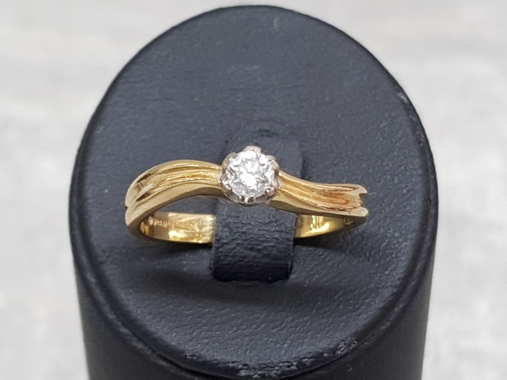 An 18ct yellow gold and diamind solitare ring, the diamond weighing .15 carats, 4.2g gross, size O - Image 3 of 3