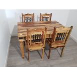 Exotic hardwood table and 4 matching chairs, 134x90cm, height 76cm