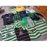 Box of mixed clothing mainly football tops, Celtic and Scotland