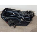 Folding wheelchair with carry bag