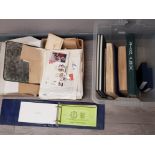 Box containing stamp albums and loose stamps