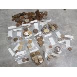 Box of miscellaneous coinage from around the world, maily old british coins but also includes