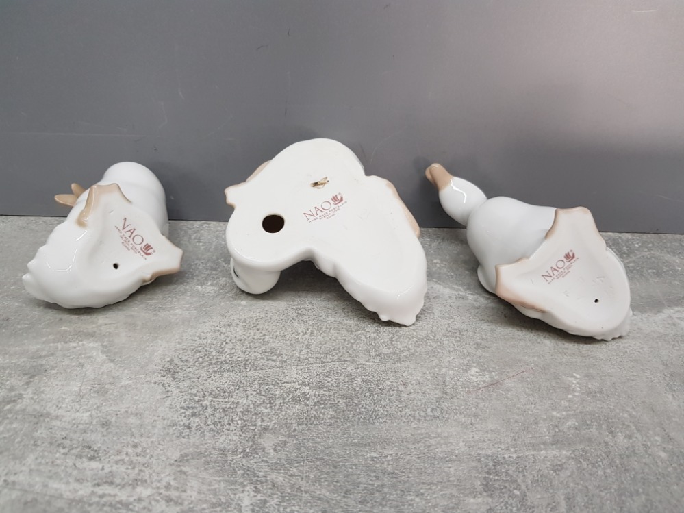 Three Nao white duck figurines and group. - Image 2 of 2