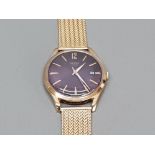 A stylish 1970s gold plated gents wristwatch by Henry of London, purple enamel Roman dial with