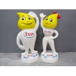 A reproduction pair of cast iron Esso money boxes Herr and Frau.