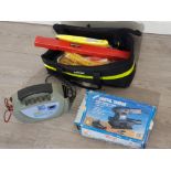 Rolson bag containing miscellaneous hand tools also includes Dual voltage battery charger and