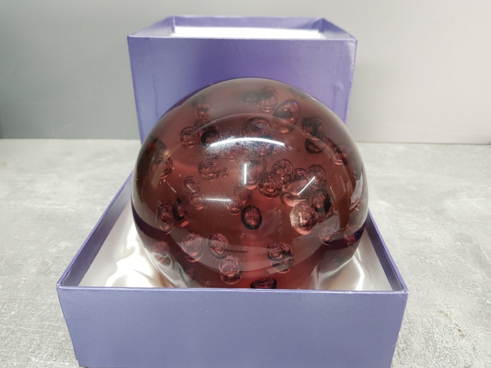 A large glass paperweight, 15cm high, boxed.