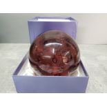 A large glass paperweight, 15cm high, boxed.