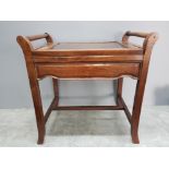 A good quality late 19th/early 20th century Chinese rosewood piano stool with hinged seat.