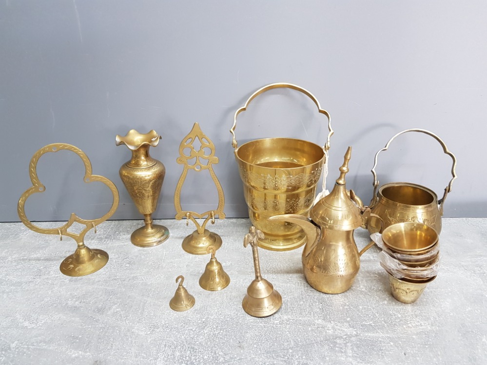 Brassware to include an ice bucket, bell, stands etc.