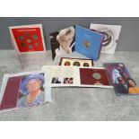 Five Royal Mint commemorative coin sets including Diana Princess of Wales memorial coin.