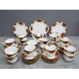 Royal Albert Old Country Roses tea service for 12, one tea plate missing.