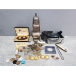 A silver plated sugar sifter, coins, penknife, belt etc.