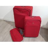 3 piece Samsonite luggage set in distinctive red, includes 2x suitcases and 1x holdhall