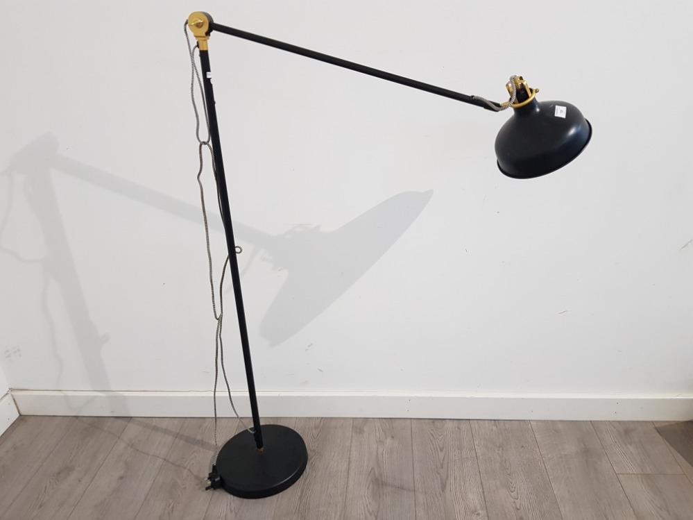 An ikea anglepoise floor lamp.