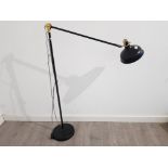 An ikea anglepoise floor lamp.