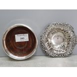 A silver bon bon dish and a silver and wooden wine coaster, 112.1g gross.