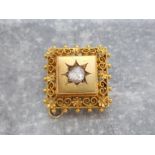 22ct yellow gold antique diamond broach set with a single rose cut diamond in the centre with ornate