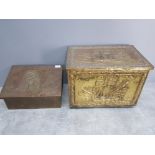 Two vintage brass coalboxes with ship decoration.