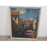 An oil painting by Karlin, continental townscape signed and dated '61, 90 x 79cm.