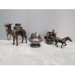 Three table lighters to include a camel and horse and carriage.