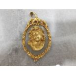 9ct yellow gold ornate diamond pendant, featuring an oval stone set with ladies gold head in the