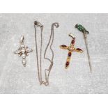 A Victorian turquoise stick pin in the form of a parrot, a silver and white stone crucifix and