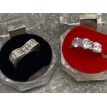 2 silver and CZ rings, sizes L and M (3 stone), 10.5G gross