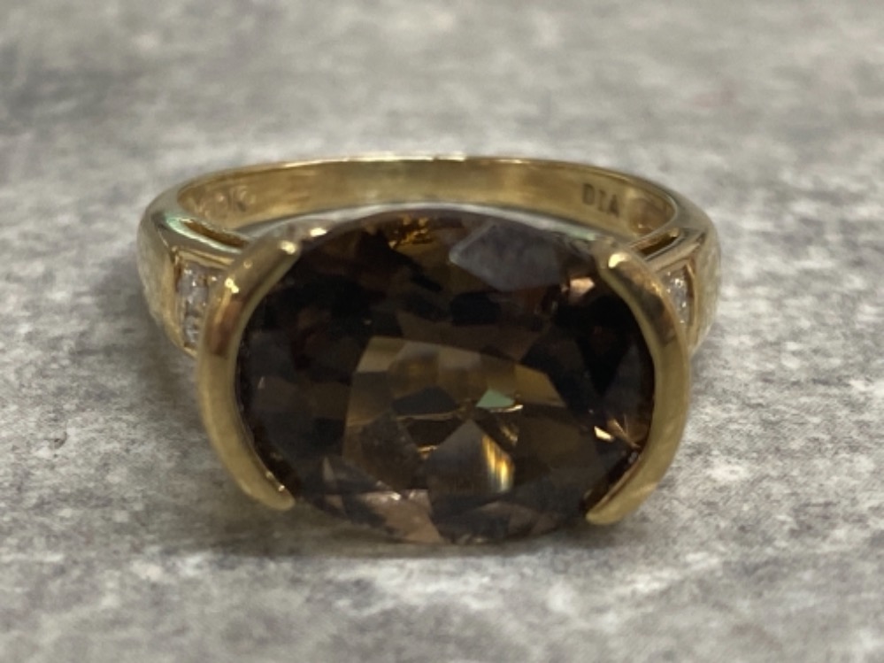 9ct gold Smokey quartz ring with diamond shoulders, 3.79g